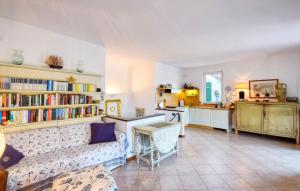 a living room with a couch and a kitchen at Lovely Home In Recco With Wifi in Recco