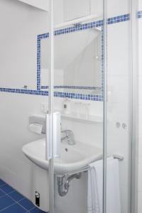 Koupelna v ubytování Hotel Kredell