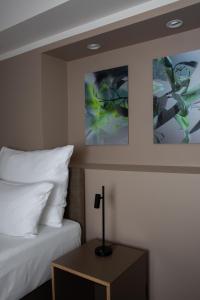Postel nebo postele na pokoji v ubytování Hotel Kredell
