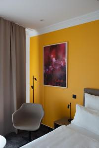 Postel nebo postele na pokoji v ubytování Hotel Kredell