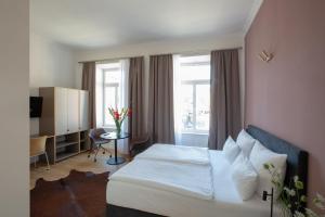 Postel nebo postele na pokoji v ubytování Hotel Kredell
