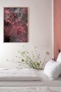 Postel nebo postele na pokoji v ubytování Hotel Kredell