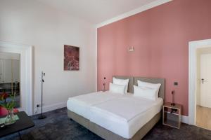 Postel nebo postele na pokoji v ubytování Hotel Kredell