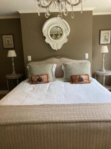 Ein Bett oder Betten in einem Zimmer der Unterkunft Villa Reynaert