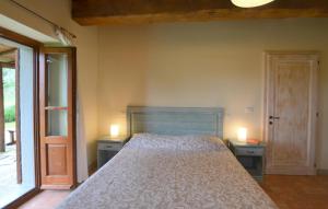 Ένα ή περισσότερα κρεβάτια σε δωμάτιο στο Amazing Apartment In Ponte Alla Piera