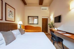Postel nebo postele na pokoji v ubytování Guest House Morandi