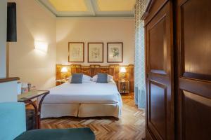 Postel nebo postele na pokoji v ubytování Guest House Morandi