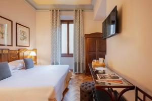Postel nebo postele na pokoji v ubytování Guest House Morandi