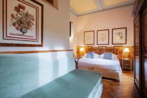 Postel nebo postele na pokoji v ubytování Guest House Morandi