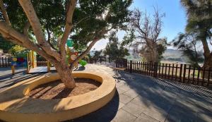 A garden outside Stylish 3BR home with large terrace in Mosta by 360 Estates