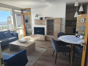 Khu vực ghế ngồi tại Haus Uthlande Ferienwohnung Küstenperle
