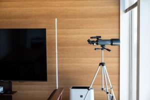 TV a/nebo společenská místnost v ubytování STAY in 小平