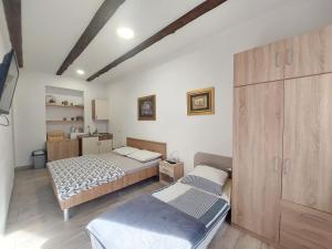 Ένα ή περισσότερα κρεβάτια σε δωμάτιο στο Home Away From Home - Apartment Ilica +38 φωτογραφίες