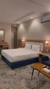 Voodi või voodid majutusasutuse شقق هوليداي بلس مشرفه - Holiday Plus Mishrifah Apartments toas +18 fotot