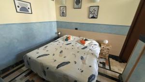 Postel nebo postele na pokoji v ubytování Cuneo Centro Affittacamere
