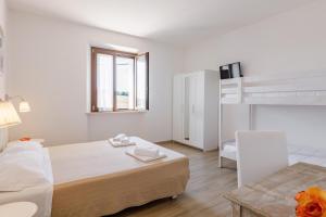 Postel nebo postele na pokoji v ubytování B&B Isa
