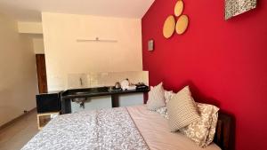 Postel nebo postele na pokoji v ubytování Arize You Homes Anjuna