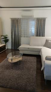 Postel nebo postele na pokoji v ubytování Apartman Breza