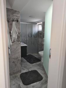a bathroom with a sink and a toilet at Melikoğlu Suite in Dernekpazarı +14 photos