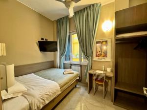 Postel nebo postele na pokoji v ubytování Hotel Parma + 28 fotografií
