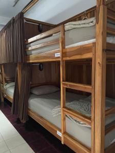 Postel nebo postele na pokoji v ubytování WW Backpackers