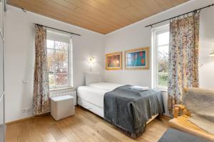 Ένα ή περισσότερα κρεβάτια σε δωμάτιο στο Charming villa with a hot tub, by the Golden Circle