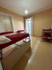 Postel nebo postele na pokoji v ubytování Salerno Experience Hostel