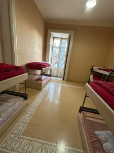 Postel nebo postele na pokoji v ubytování Salerno Experience Hostel