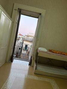 Postel nebo postele na pokoji v ubytování Salerno Experience Hostel