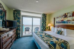 Postelja oz. postelje v sobi nastanitve Paradise Resort, Unit 802, 4 Bedroom, 3 Bath, Direct Oceanfront