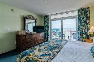 Postelja oz. postelje v sobi nastanitve Paradise Resort, Unit 802, 4 Bedroom, 3 Bath, Direct Oceanfront