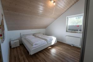 Postel nebo postele na pokoji v ubytování Seestern 1 - Nordhorn