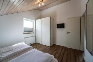 Postel nebo postele na pokoji v ubytování Seestern 1 - Nordhorn + 25 fotografií