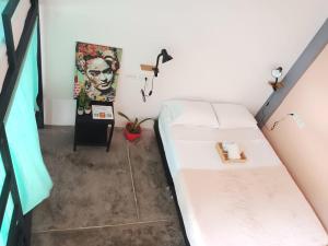 A bed or beds in a room at Imagine hostel