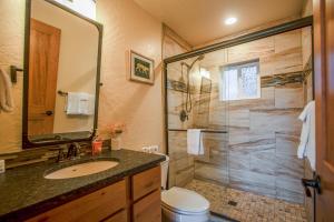 a bathroom with a shower and a sink and a toilet at Dover Bay Way in Dover +45 photos