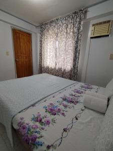 Postel nebo postele na pokoji v ubytování Villa Feliza