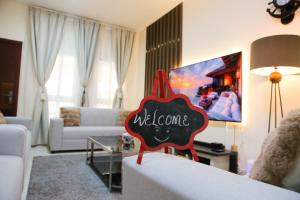 TV a/nebo společenská místnost v ubytování Agoo Homes