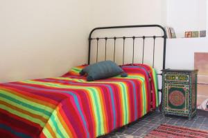 En eller flere senge i et værelse på Chez sarah