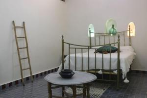 En eller flere senge i et værelse på Chez sarah + 18 billeder