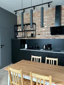 Kuchyňa alebo kuchynka v ubytovaní City center apartment-Wrocławska