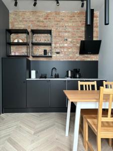 Kuchyňa alebo kuchynka v ubytovaní City center apartment-Wrocławska