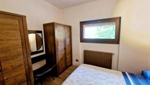 Letto o letti in una camera di Rifugio Elite Terminillo