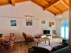 a living room with a couch and a table at Apartman Boljević in Podgorica