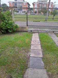 Billede fra billedgalleriet på Verão para 10 pessoas em frente à Praça Boianovsky i Capão da Canoa