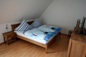 Ένα ή περισσότερα κρεβάτια σε δωμάτιο στο Haus 145 2, Kiefernweg 10 a