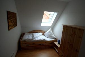 Ένα ή περισσότερα κρεβάτια σε δωμάτιο στο Haus 145 2, Kiefernweg 10 a