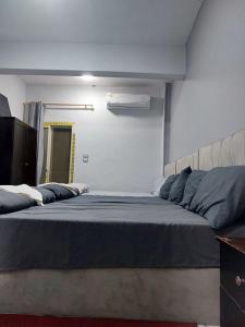 Letto o letti in una camera di Eljoker pyramids hostel