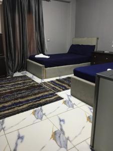Letto o letti in una camera di Eljoker pyramids hostel