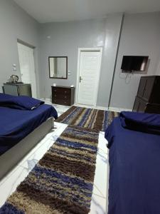 Letto o letti in una camera di Eljoker pyramids hostel