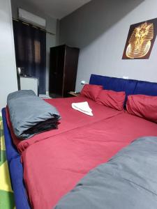 Letto o letti in una camera di Eljoker pyramids hostel